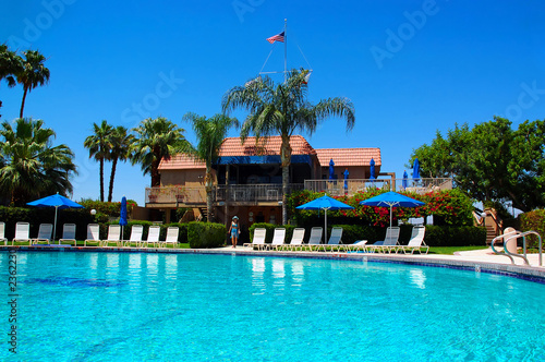 girl poolside in palm springs, california