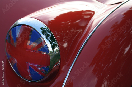 detail of flag headlight cover on vintage british