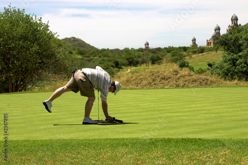 golfer on the green.