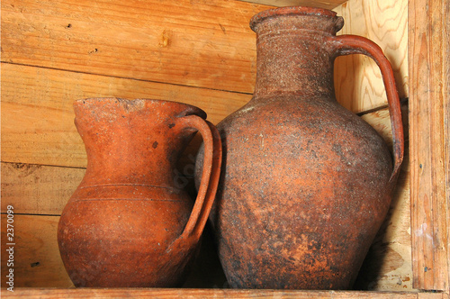 old clay wine jugs in a traditional adega wine cellar in the azo