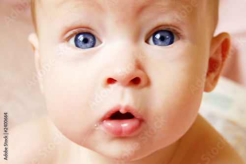 close up of babies face