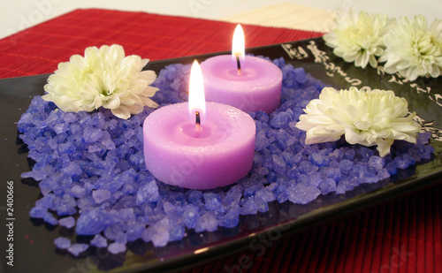 spa essentials (violet salt, candles and flowers)