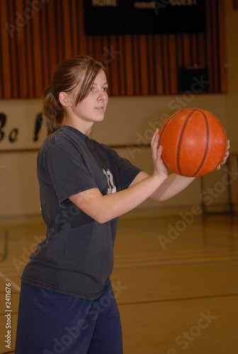 young woman playing basketball 2