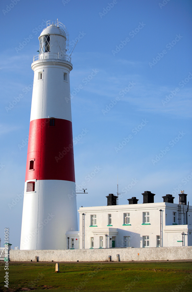 main red and white lighthouse on portland near wey main red and white lighthouse on portland near wey