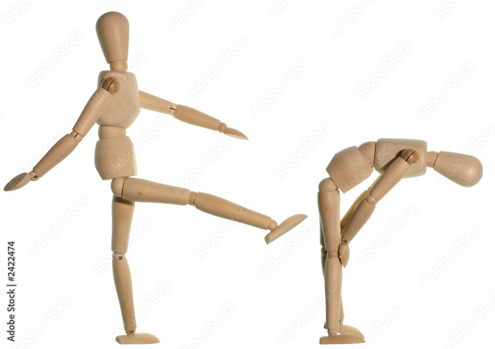 a mannequin giving a motivational kick. a mannequin giving a motivational kick.