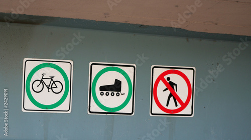 bike, rollerblade, no walking signs
