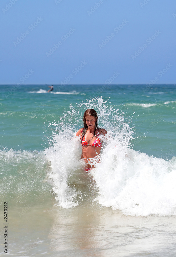 sexy attractive young girl being splashed by cold