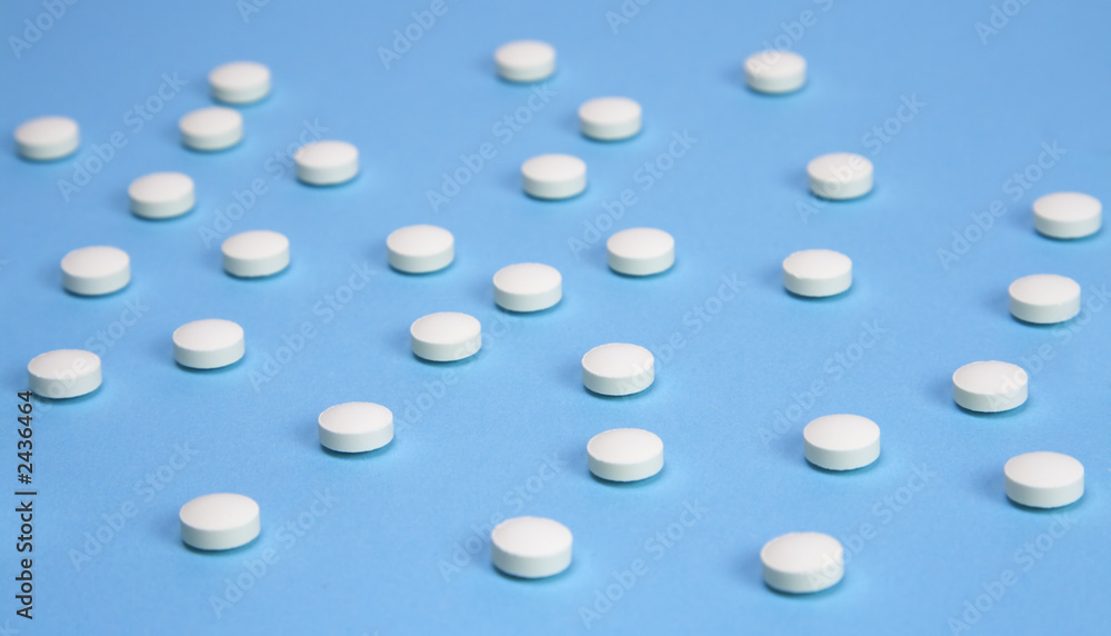 white pills background white pills background