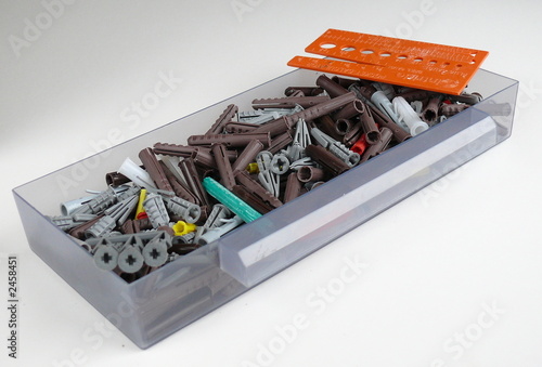 wall plugs in a plastic tray