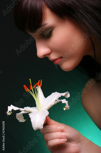 brunette with white lily flowers