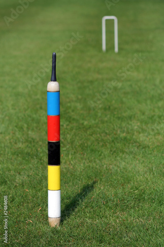 an english croquet lawn, the focus on the centre peg