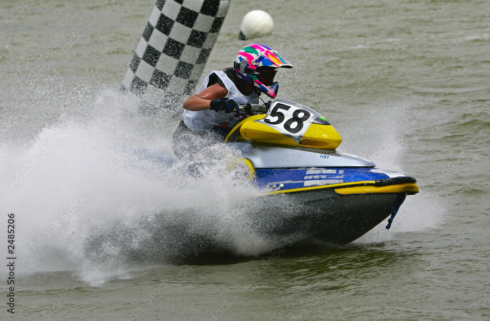 Fototapeta premium man rushes on a jetbike