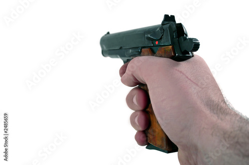 Fotografie hand holding a pistol