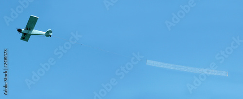 airplane towing blank banner