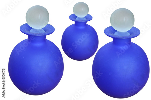 three glass bottles