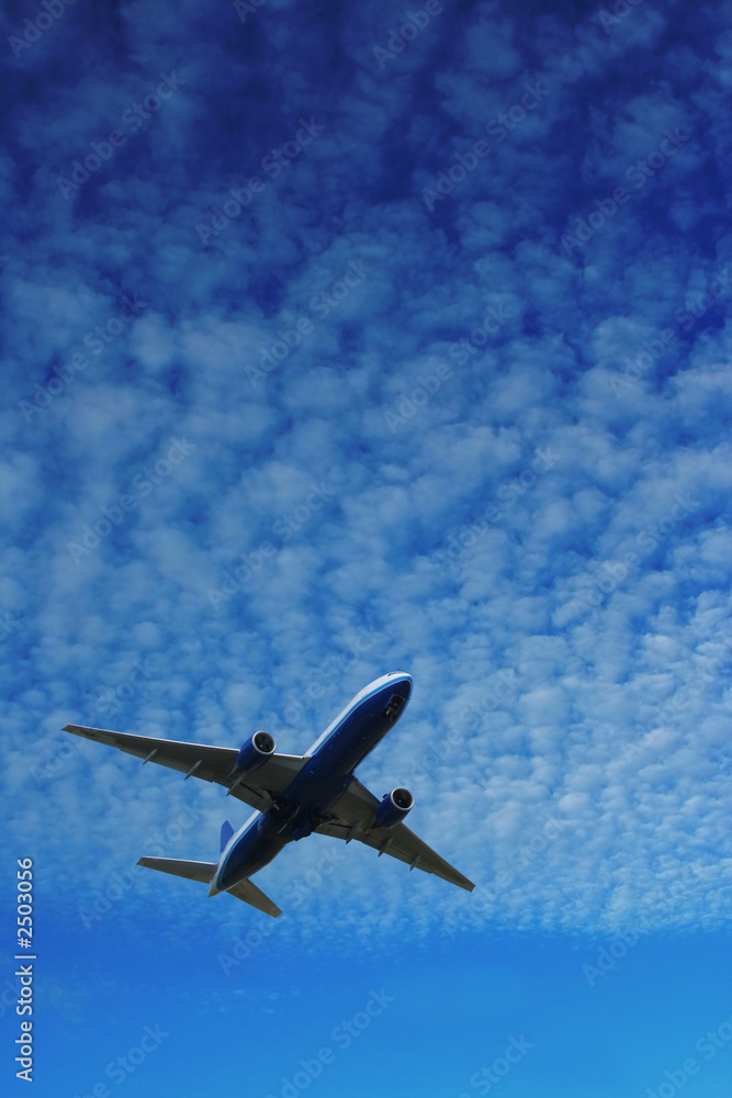 Obraz premium airplane over blue sky