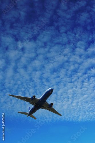 airplane over blue sky