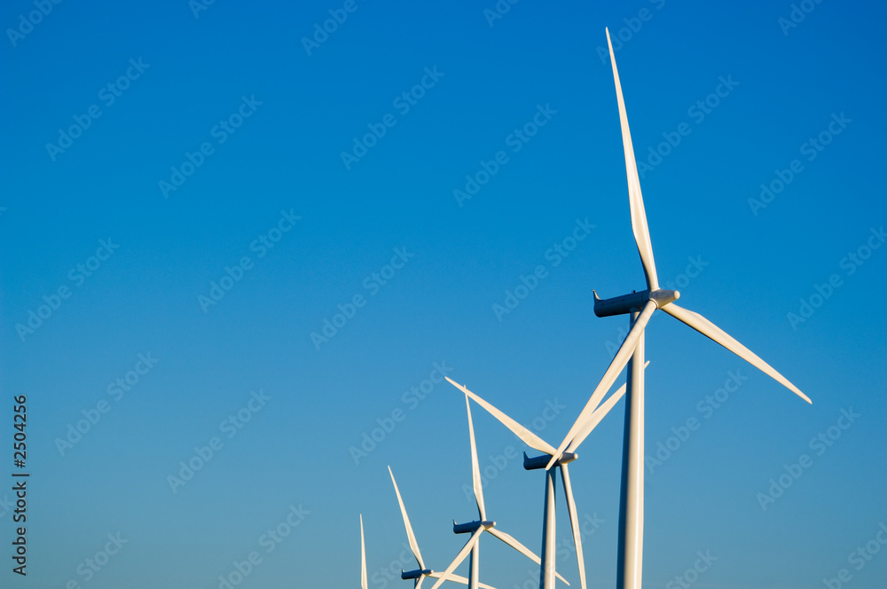 modern wind turbines or mills providing energy modern wind turbines or mills providing energy