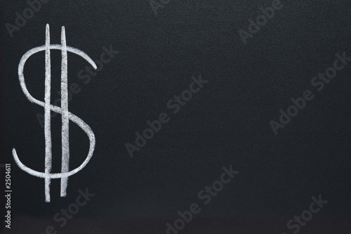 the us dollar currency symbol, written on a blackb © Sharpshot