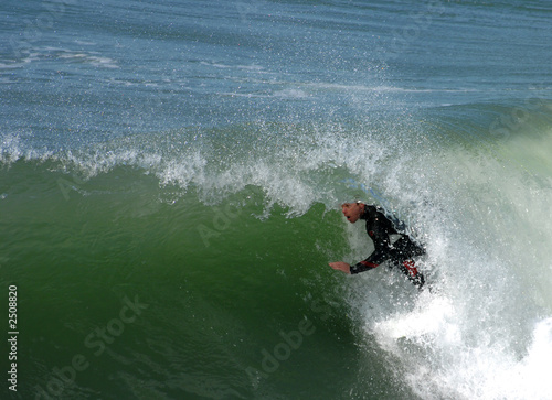 surfing in the barrel