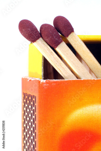 open box of matches with three match heads showing