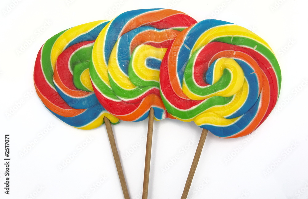 three lollipops on white background