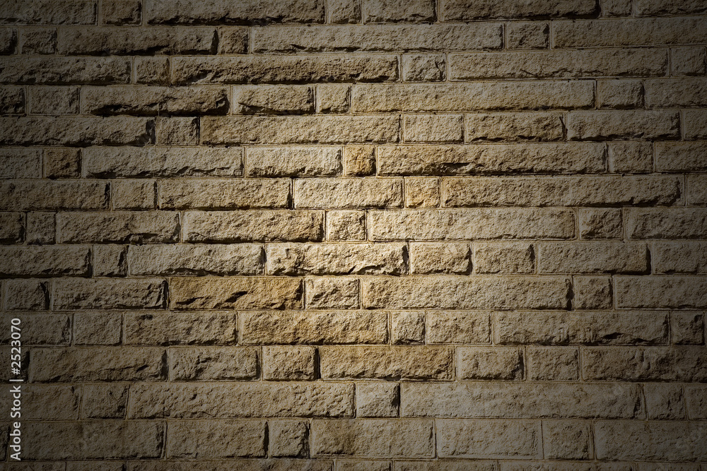 stone wall background with highlighted center