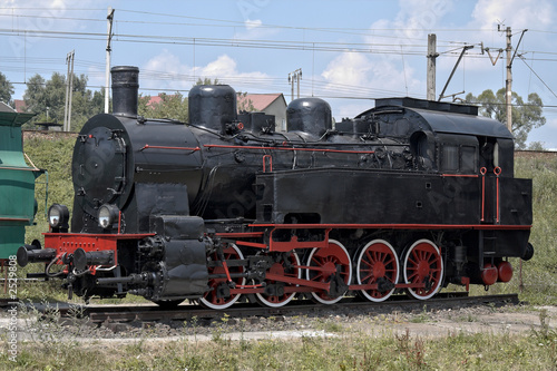 old steam engine at station