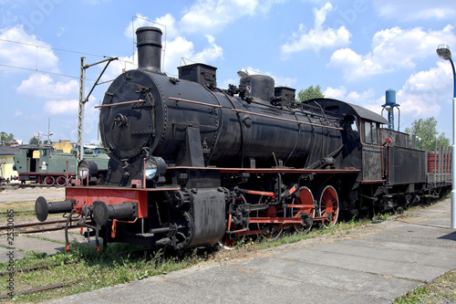 old steam engine at station