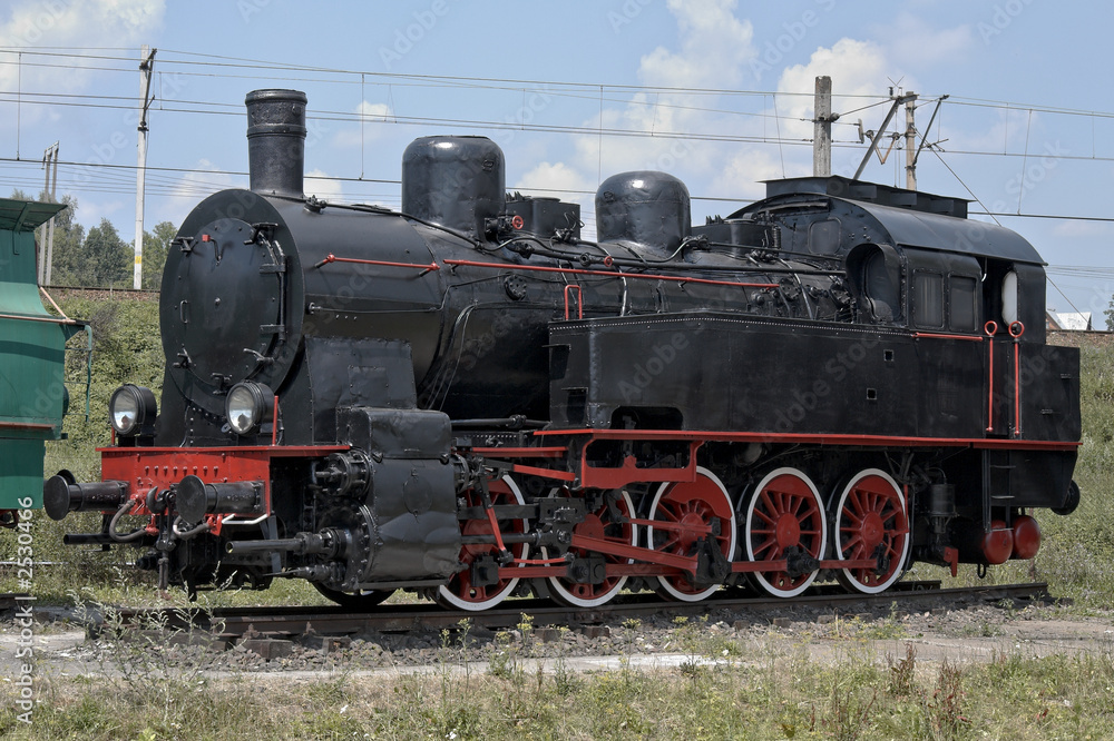 old steam engine at station