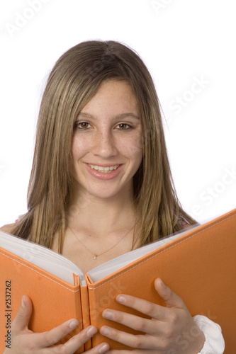 teen girl reading orange photobook