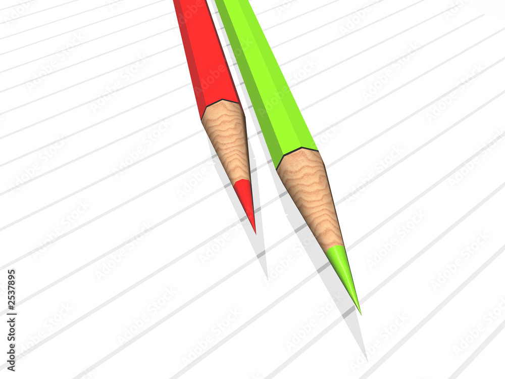 red and green pencil on note pad red and green pencil on note pad