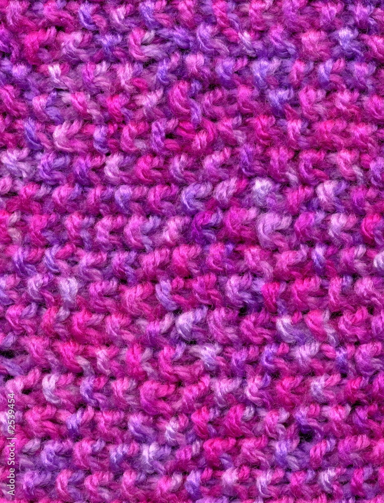 knitted wool pink colors texture background.