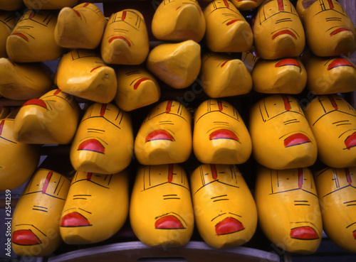 Photography yellow wooden shoes from holland
