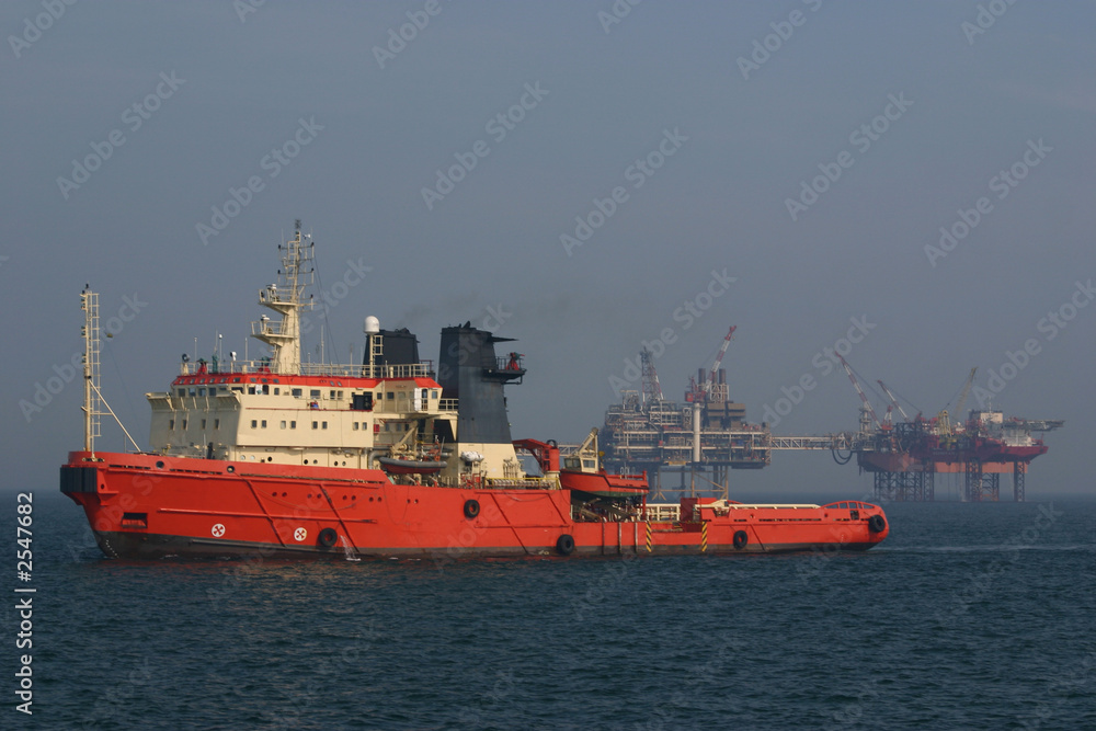 oil rig support boat keeps a watchful eye oil rig support boat keeps a watchful eye
