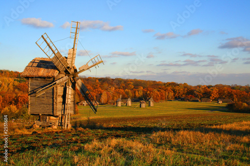 windmill at autumn landscape