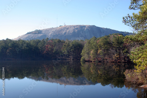 stone mountain,  reflected in a lake photo