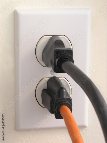 wall outlet - black and orange plug