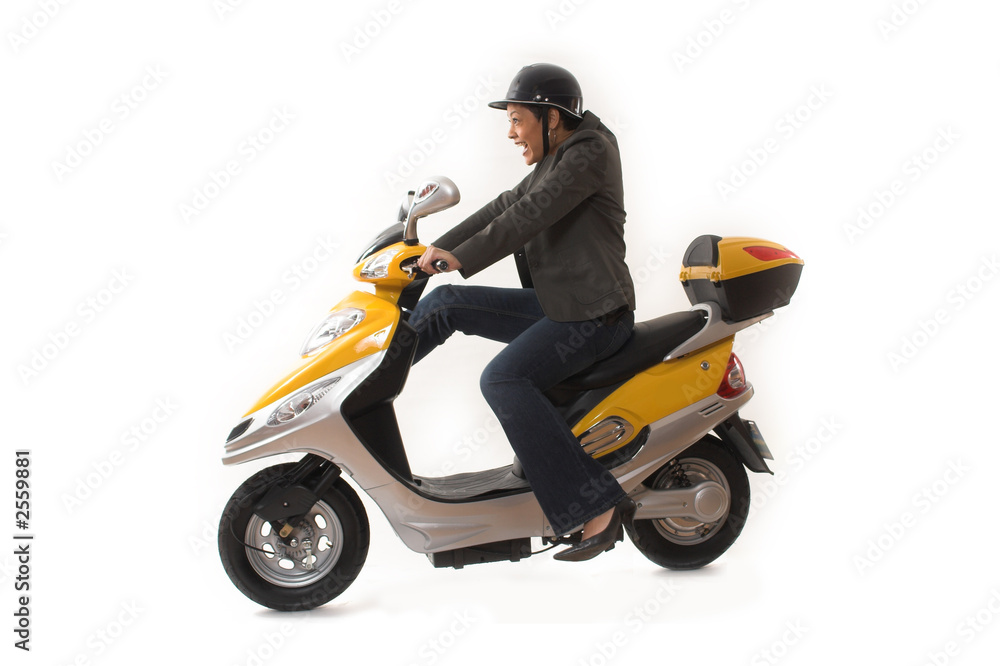 woman riding scooter woman riding scooter