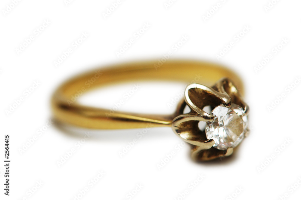 golden ring with gem isolated on white golden ring with gem isolated on white