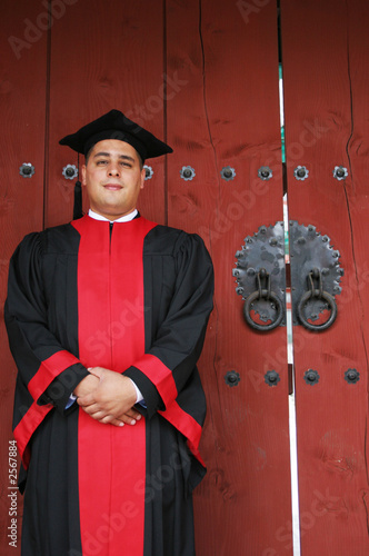 university graduate in robes photo