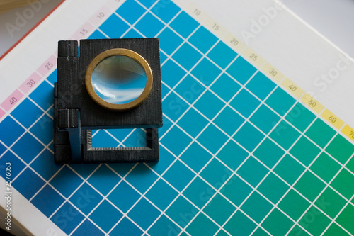 table of color with magnifier lens photo