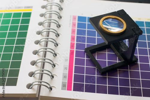 table of color with magnifier lens photo