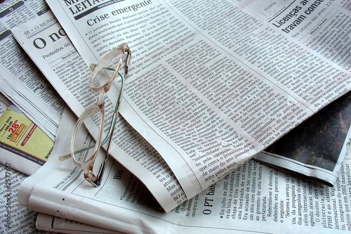 newspaper and the glasses
