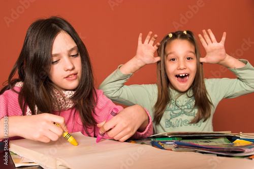 girl drawing and cheeky girl