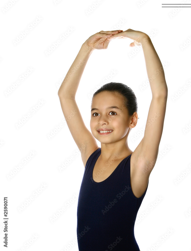 young ballerina in one of the ballet stance