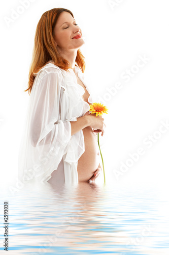 happy pregnant lady in water photo