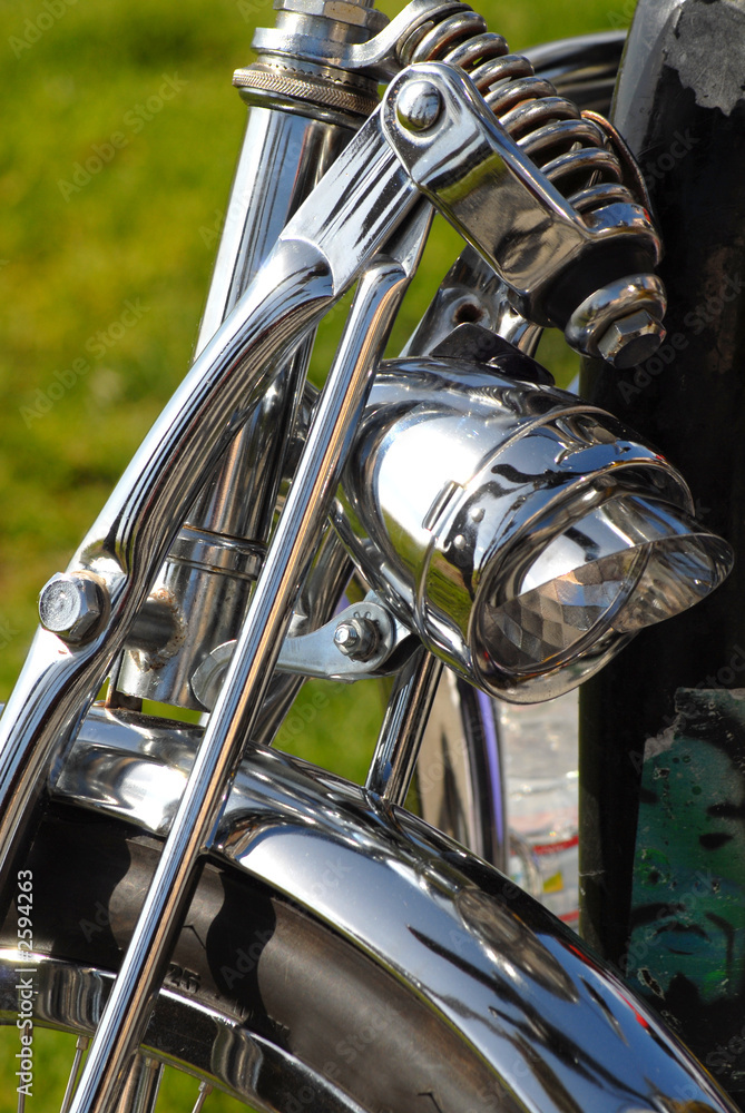 Fototapeta premium front of a motorcycle showing chrome fender and light