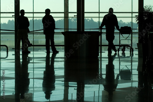 people waiting at the international airport terminal