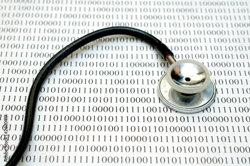 stethoscope and binary code